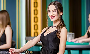Người đàn ông đang phân tích dữ liệu trận đấu trên máy tính, minh họa việc nghiên cứu kỹ lưỡng trước khi đặt cược thể thao.